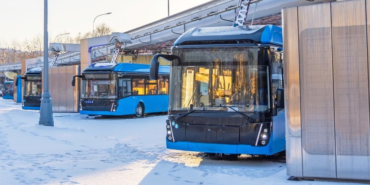 Electric buses charging at the end of a route